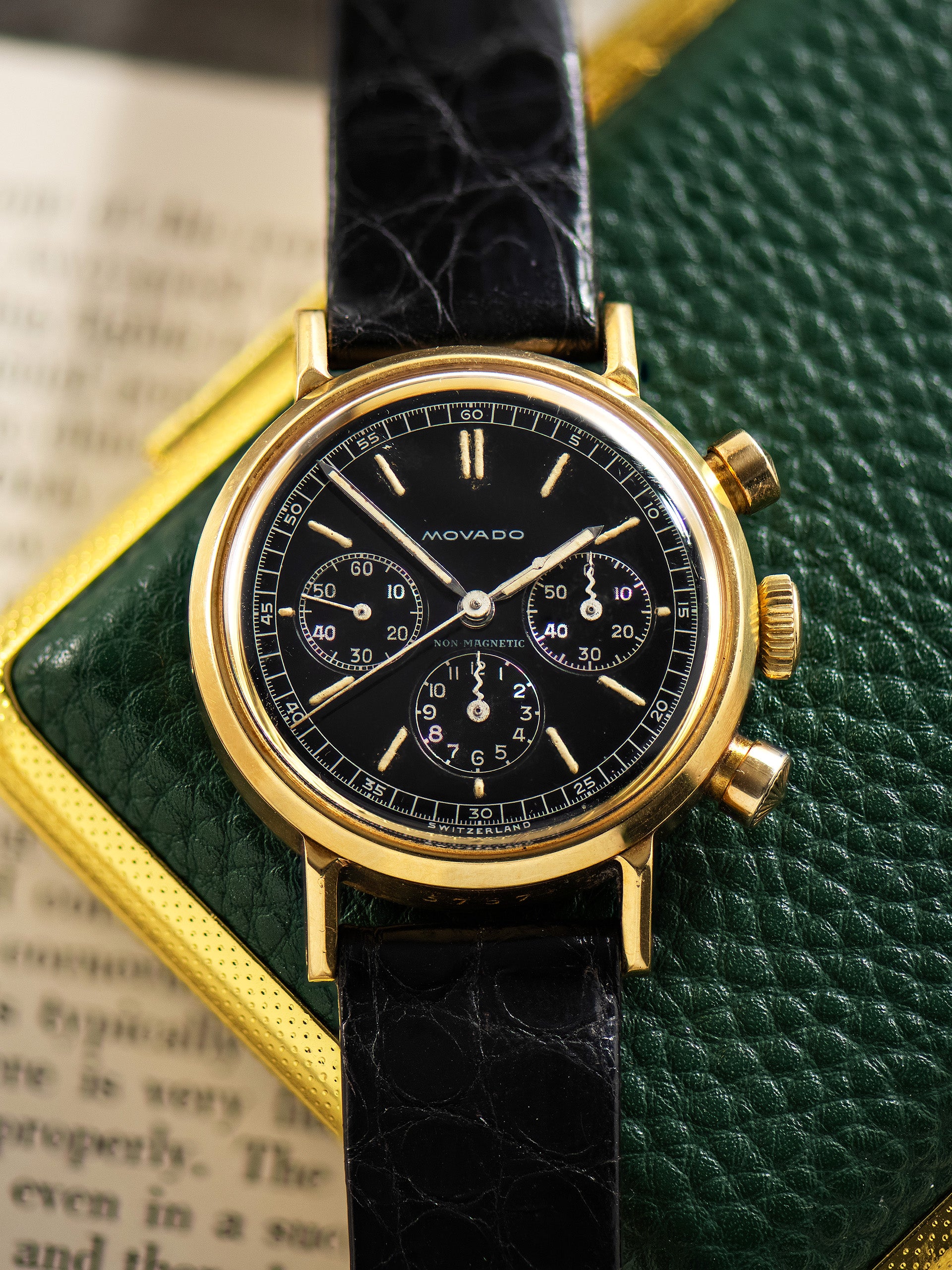 1940s Movado M95 Chronograph 18K YG (Ref. 9018) Black Gilt Dial W/ Orn