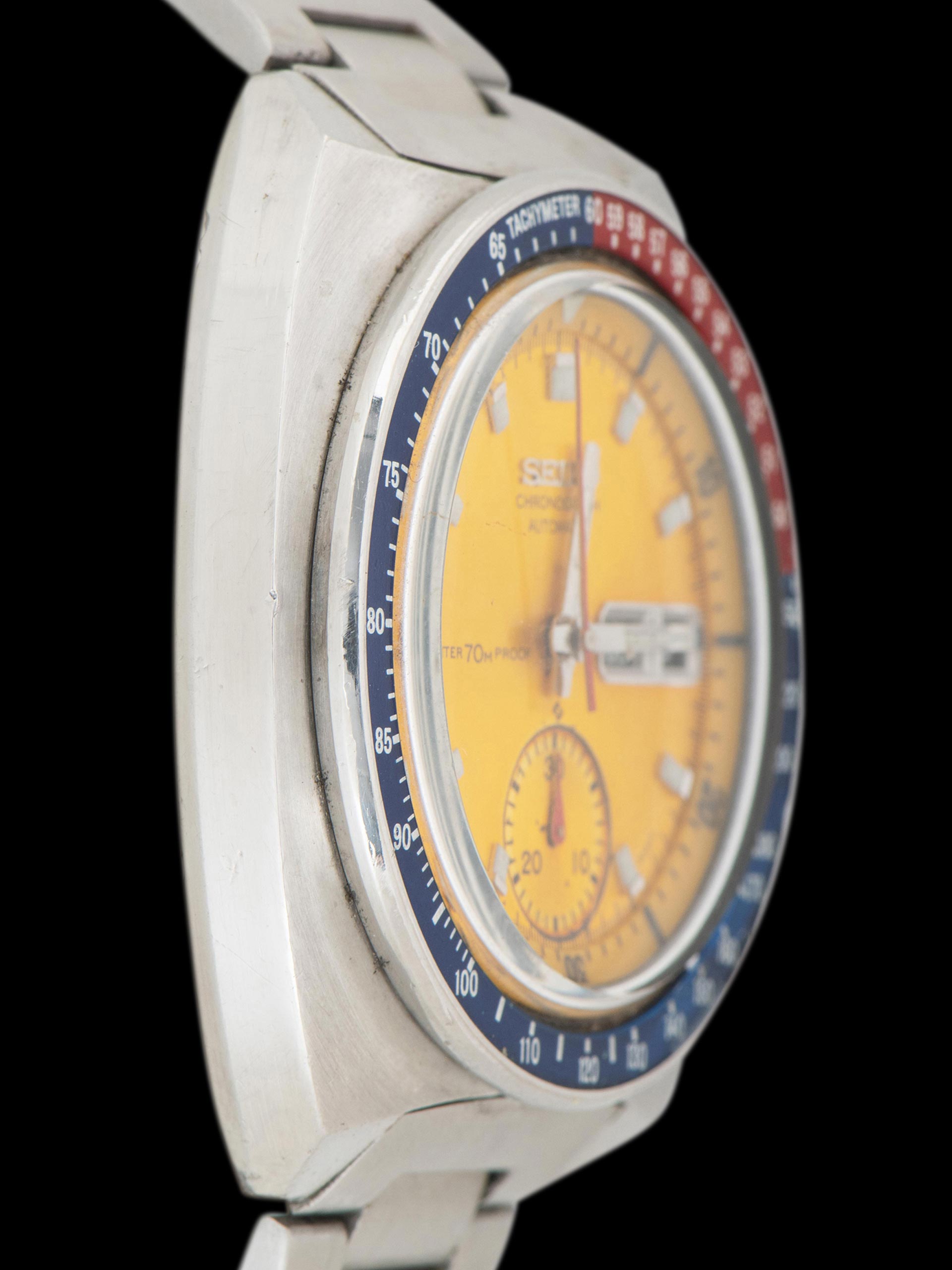 Seiko 6139-6000, Gold Dial, Notch Case. Documented specimen has an aftermarket bracelet. Photo: Craft + Tailored. · Photo: Craft + Tailored · © Craft + Tailored, used with permission · Source: https://www.craftandtailored.com/collections/seiko/products/1969-seiko-automatic-chronograph-pogue-ref-6139-6000-notch-case