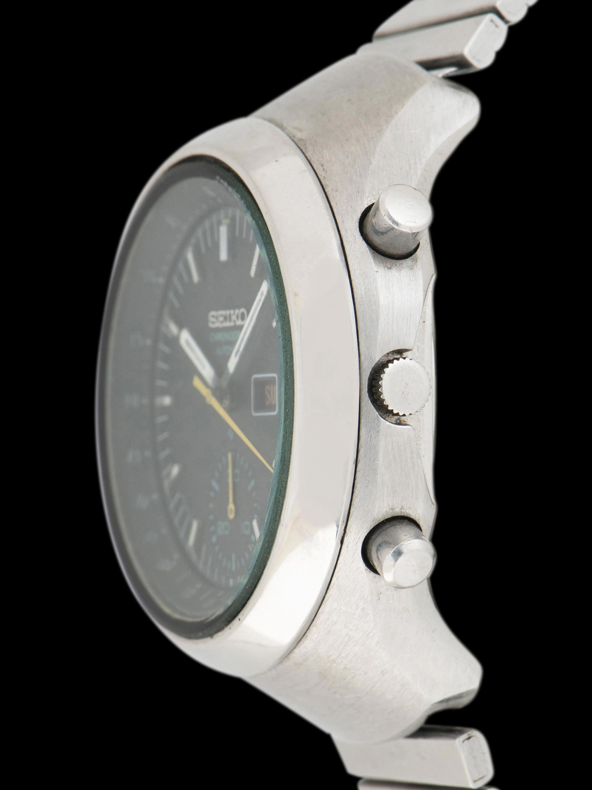 Seiko 6139-7100, Black Dial, Yellow Chronograph Hands. Documented specimen has restored hand lume. Photo: Craft + Tailored. · Photo: Craft + Tailored · © Craft + Tailored, used with permission · Source: https://www.craftandtailored.com/products/1977-seiko-automatic-chronograph-ref-6139-7100