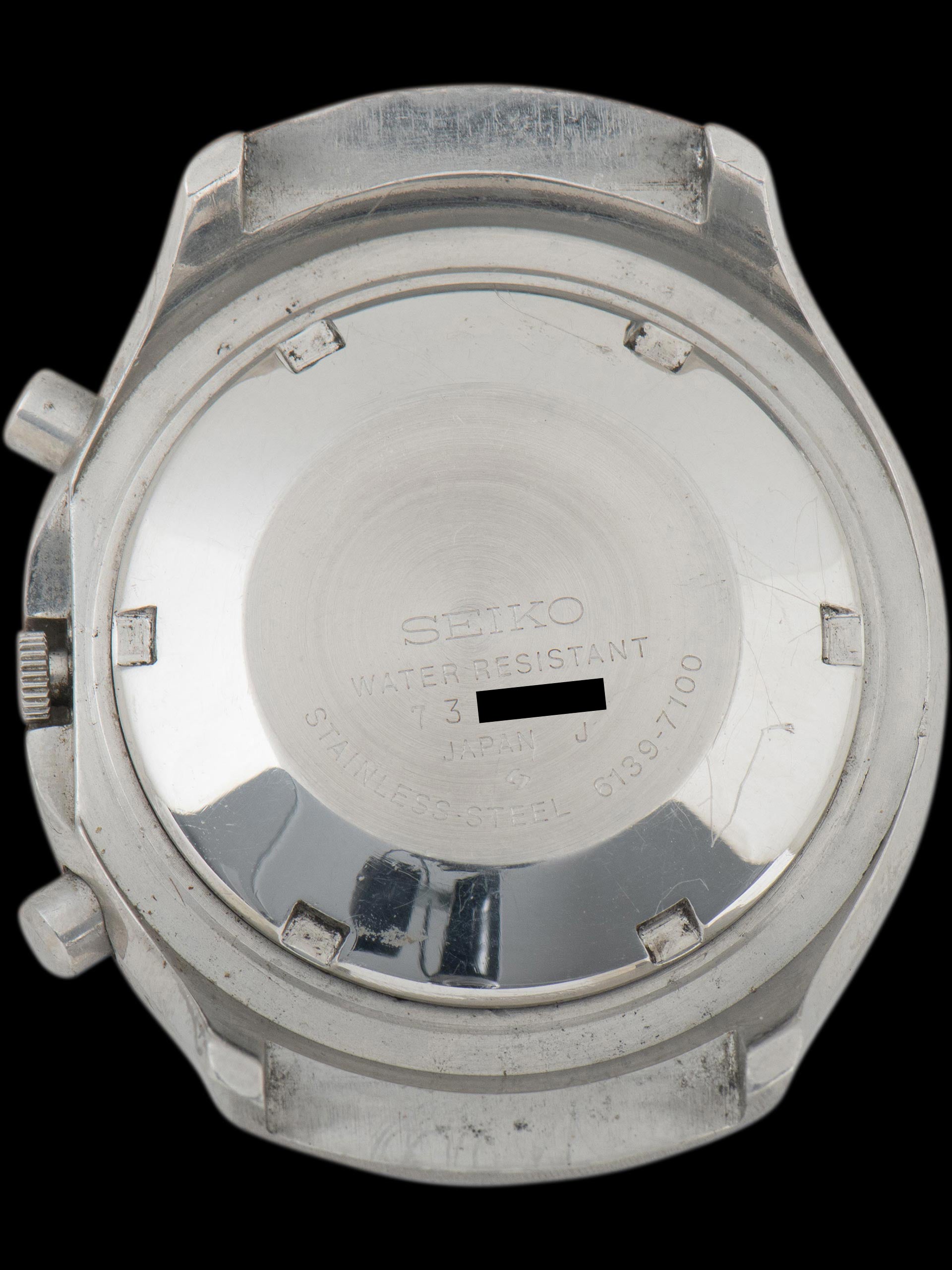 Seiko 6139-7100, Black Dial, Yellow Chronograph Hands. Documented specimen has restored hand lume. Photo: Craft + Tailored. · Photo: Craft + Tailored · © Craft + Tailored, used with permission · Source: https://www.craftandtailored.com/products/1977-seiko-automatic-chronograph-ref-6139-7100