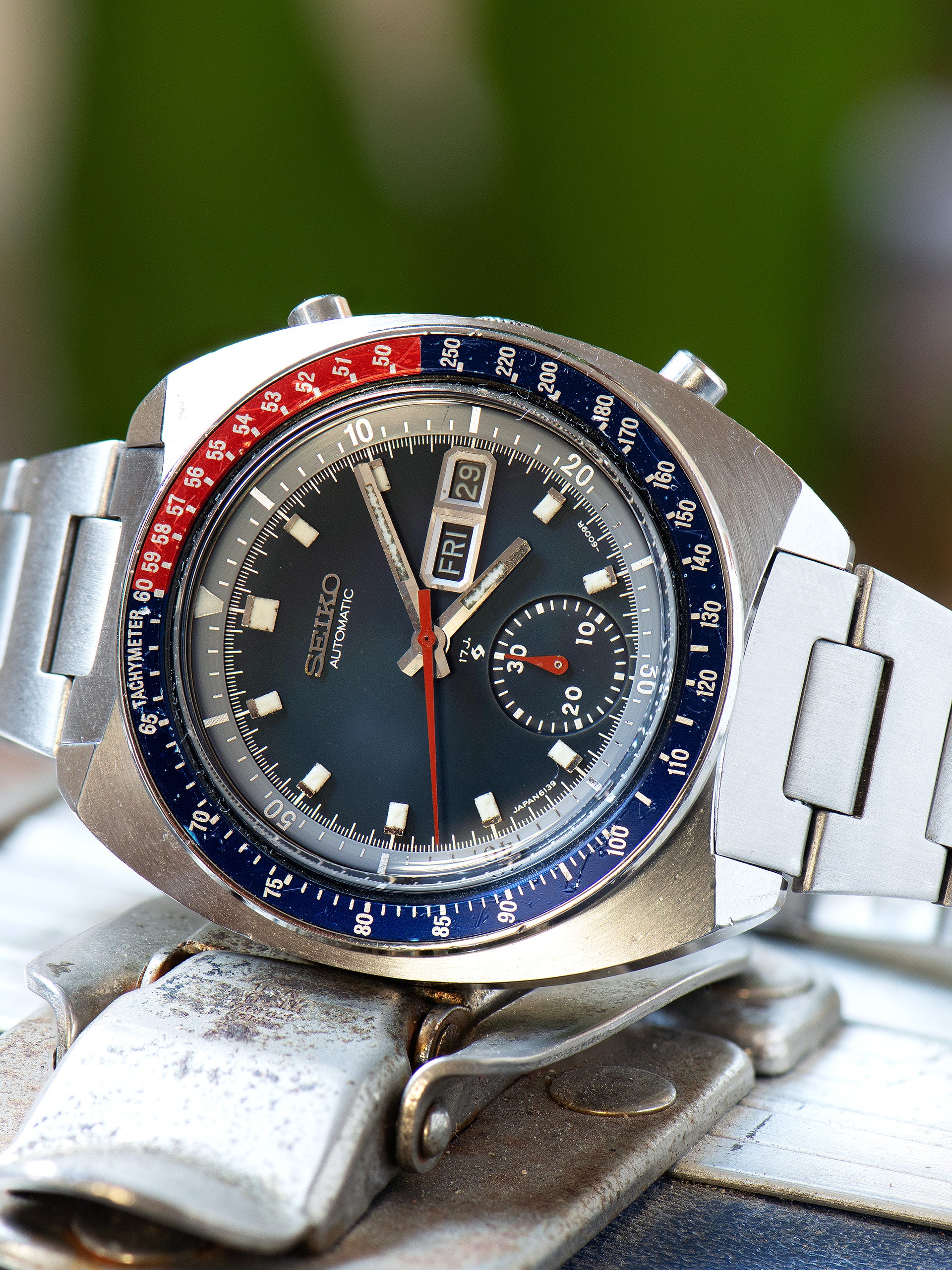 Seiko 6139-6005, Blue Dial. Documented specimen has an aftermarket bracelet. Photo: Craft + Tailored. · Photo: Craft + Tailored · © Craft + Tailored, used with permission · Source: https://www.craftandtailored.com/products/1977-seiko-automatic-chronograph-ref-6139-6005-blue-pogue