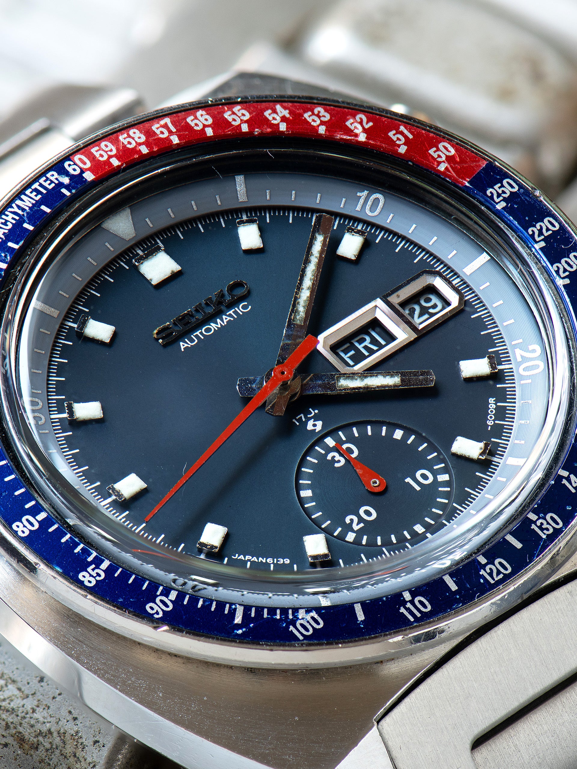 Seiko 6139-6005, Blue Dial. Documented specimen has an aftermarket bracelet. Photo: Craft + Tailored. · Photo: Craft + Tailored · © Craft + Tailored, used with permission · Source: https://www.craftandtailored.com/products/1977-seiko-automatic-chronograph-ref-6139-6005-blue-pogue